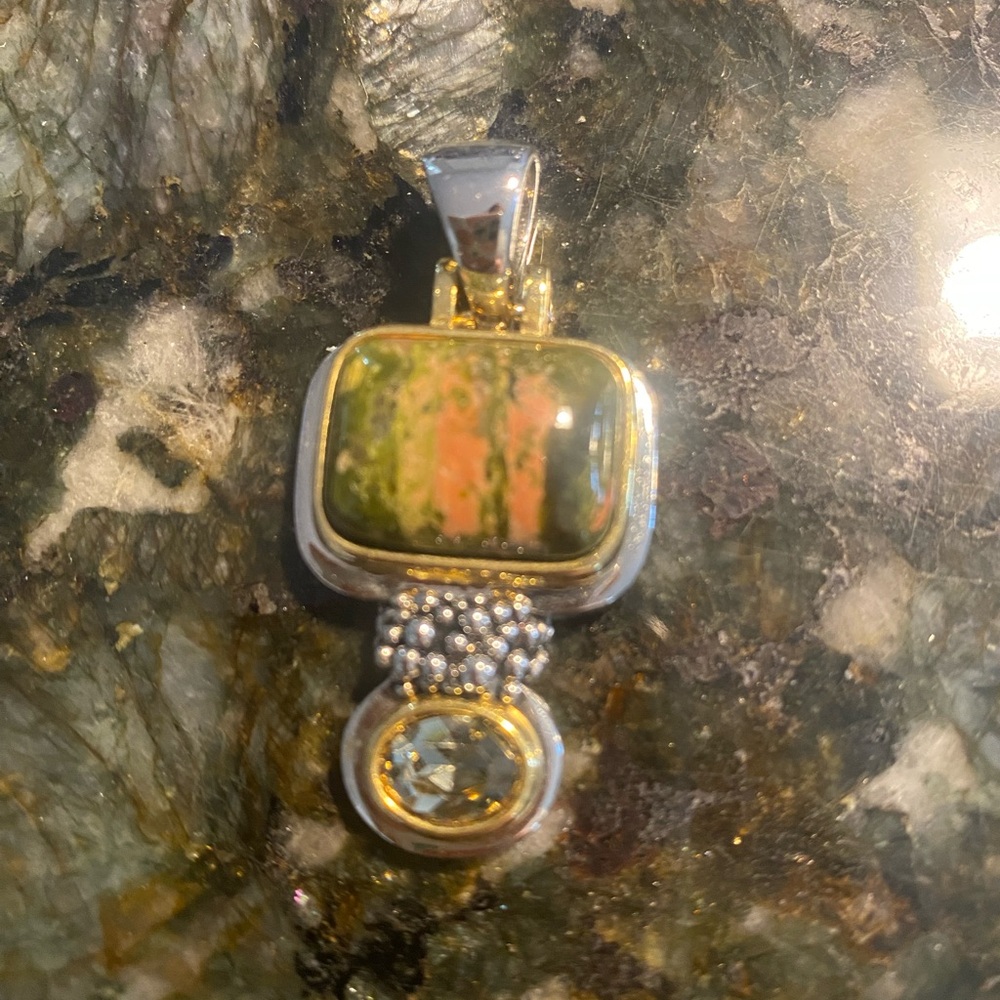 Elegant Gold and Silver Tone Pendant with serpentine and crystal